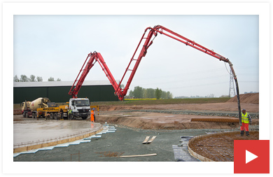 Play the film: a concrete pump placing concrete on a large site